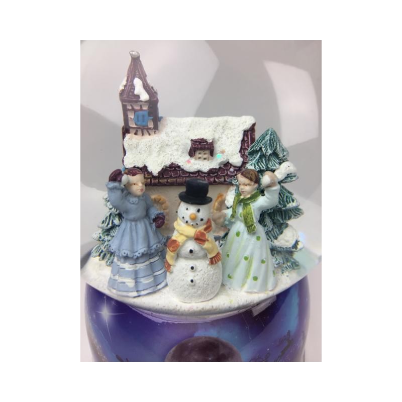 snow Globe and glitter, two girls throw snowballs at each other