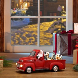 Roter nostalgischer Pick-Up mit Santa 26 cm
